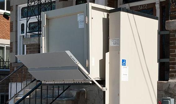 Outdoor Vertical Wheelchair Lift on front porch